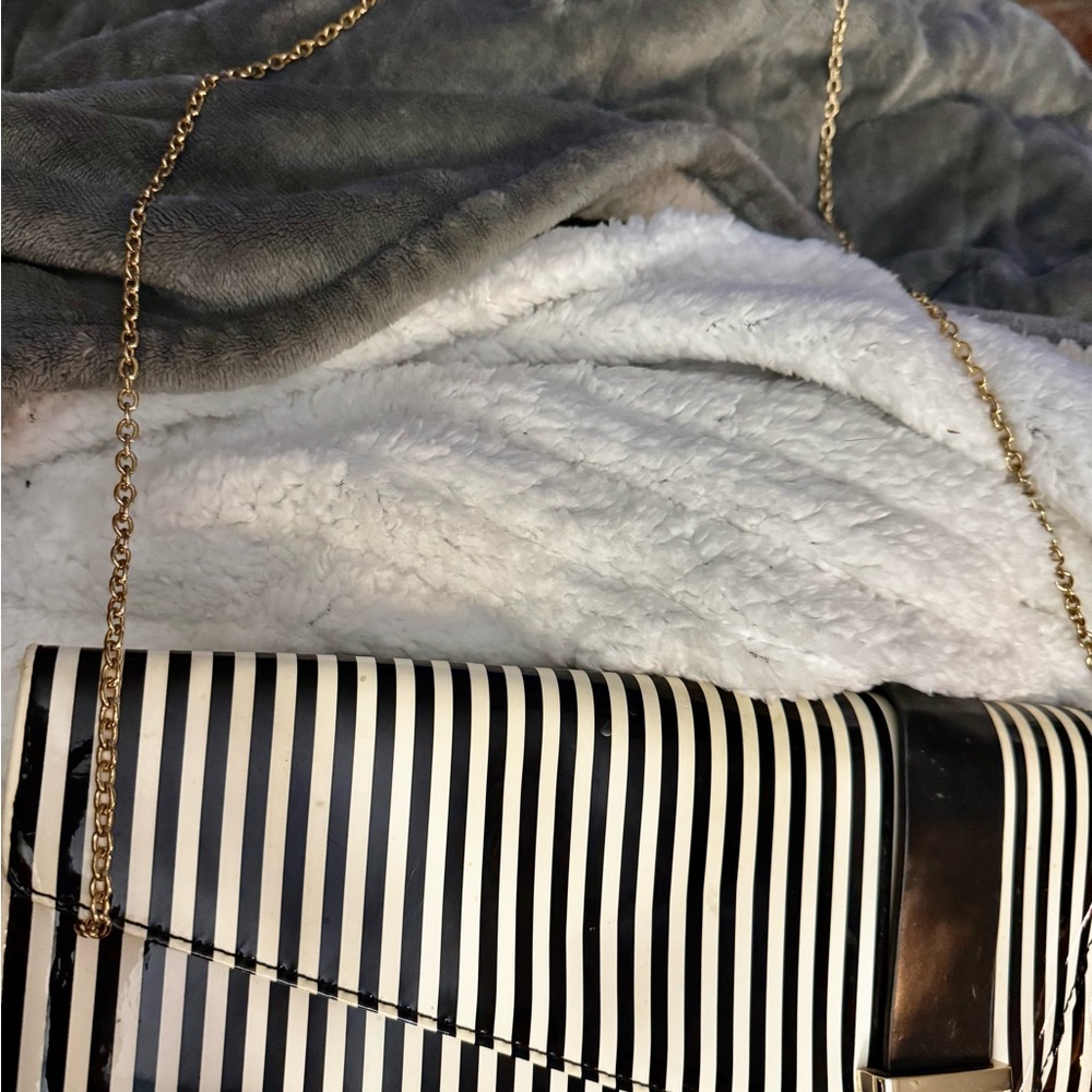 Elegant Black and White Striped Clutch with Gold Chain